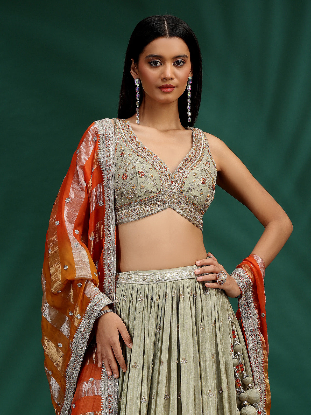 Dusty green wedding wear silk lehenga choli with orange dupatta