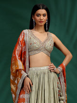 Dusty green wedding wear silk lehenga choli with orange dupatta