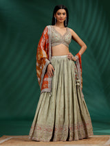 Dusty green wedding wear silk lehenga choli with orange dupatta