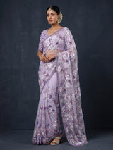 Purple reception wear net saree with heavy detailing