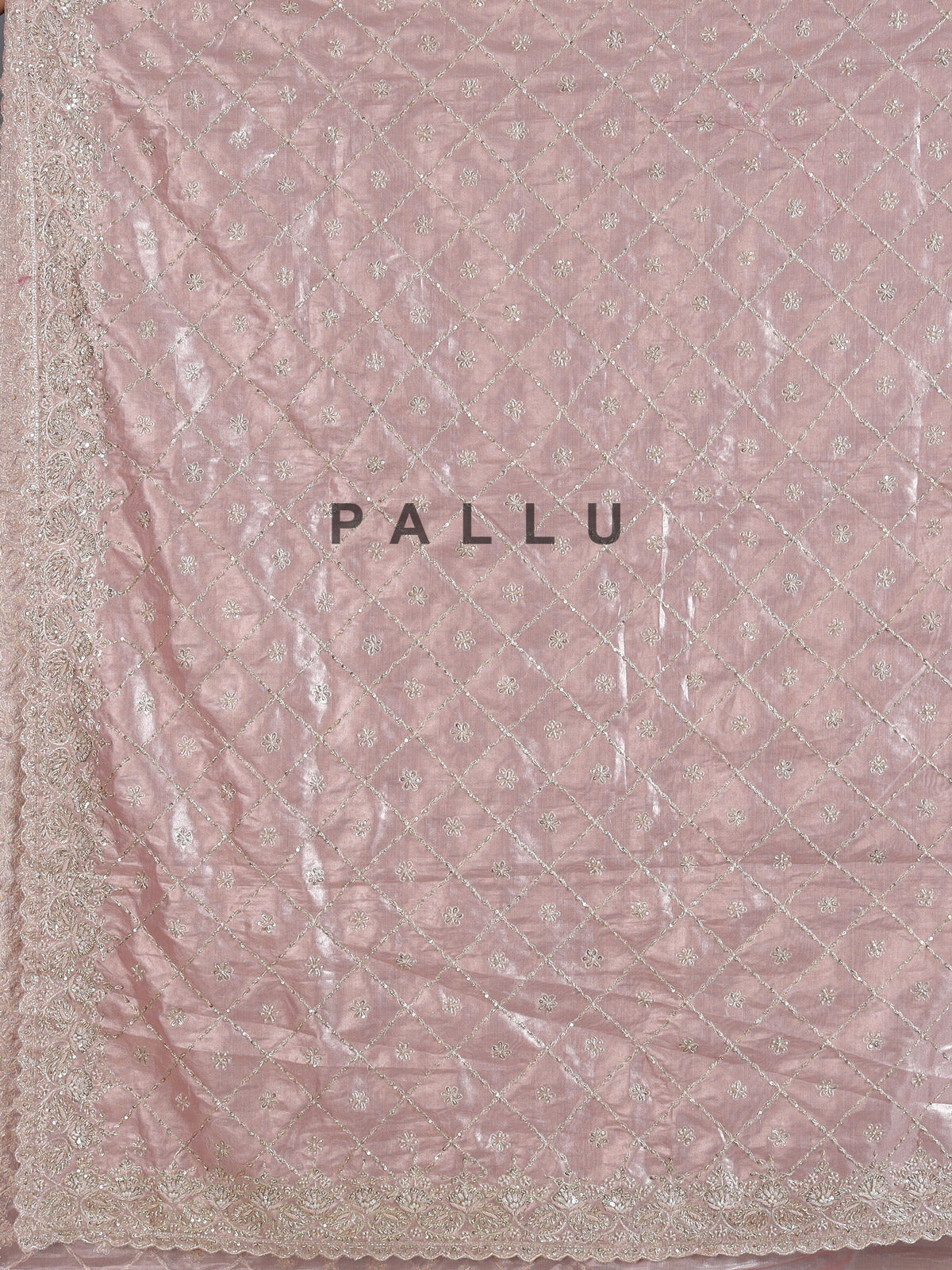 Peach tissue silk saree for wedding celebration