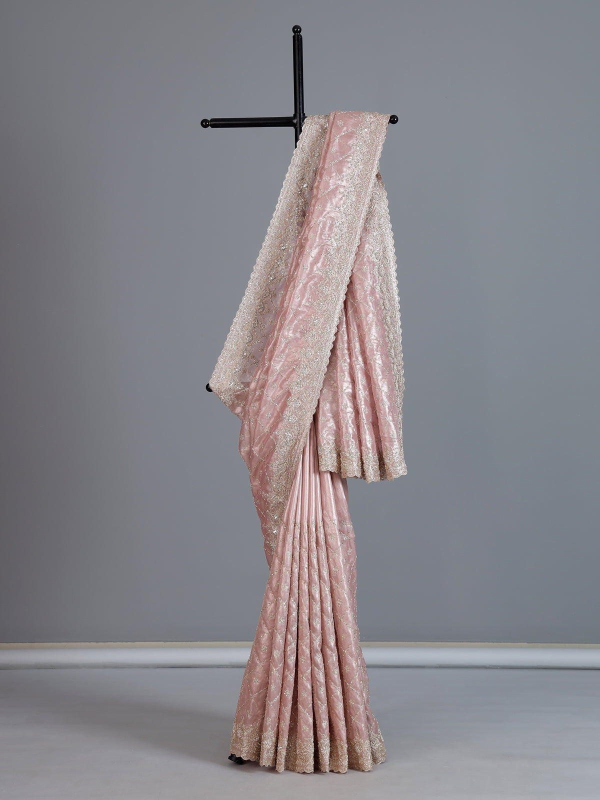 Peach tissue silk saree for wedding celebration