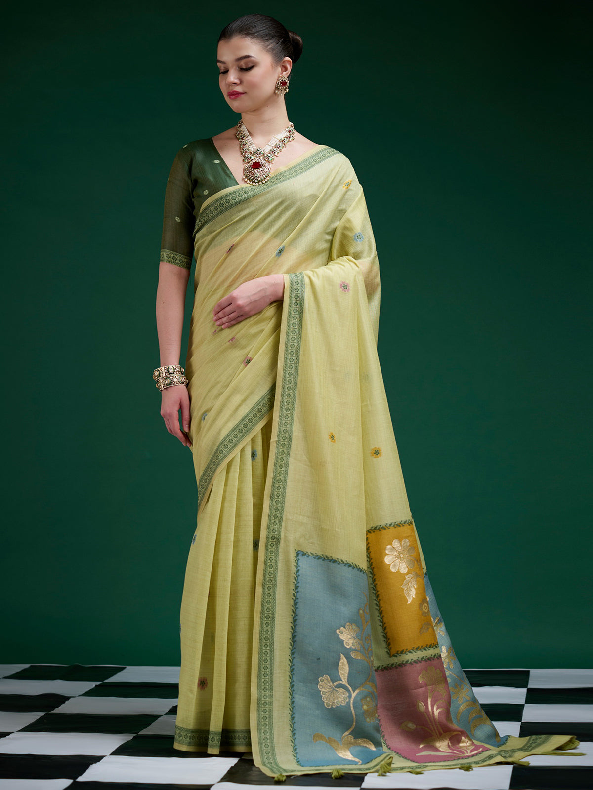 Green jamdani cotton saree with woven elegance
