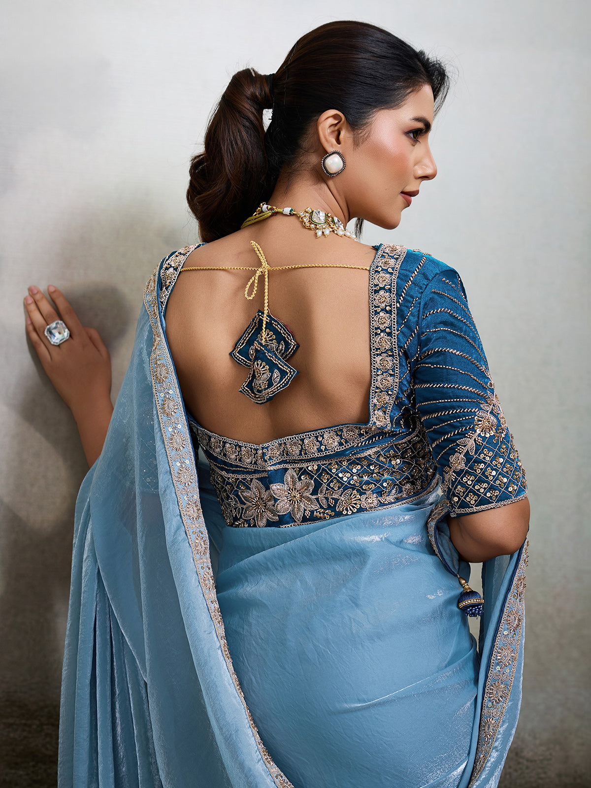 Sky blue satin saree with embroidered border