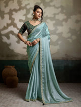 Sage green satin saree with cutdana worked blouse