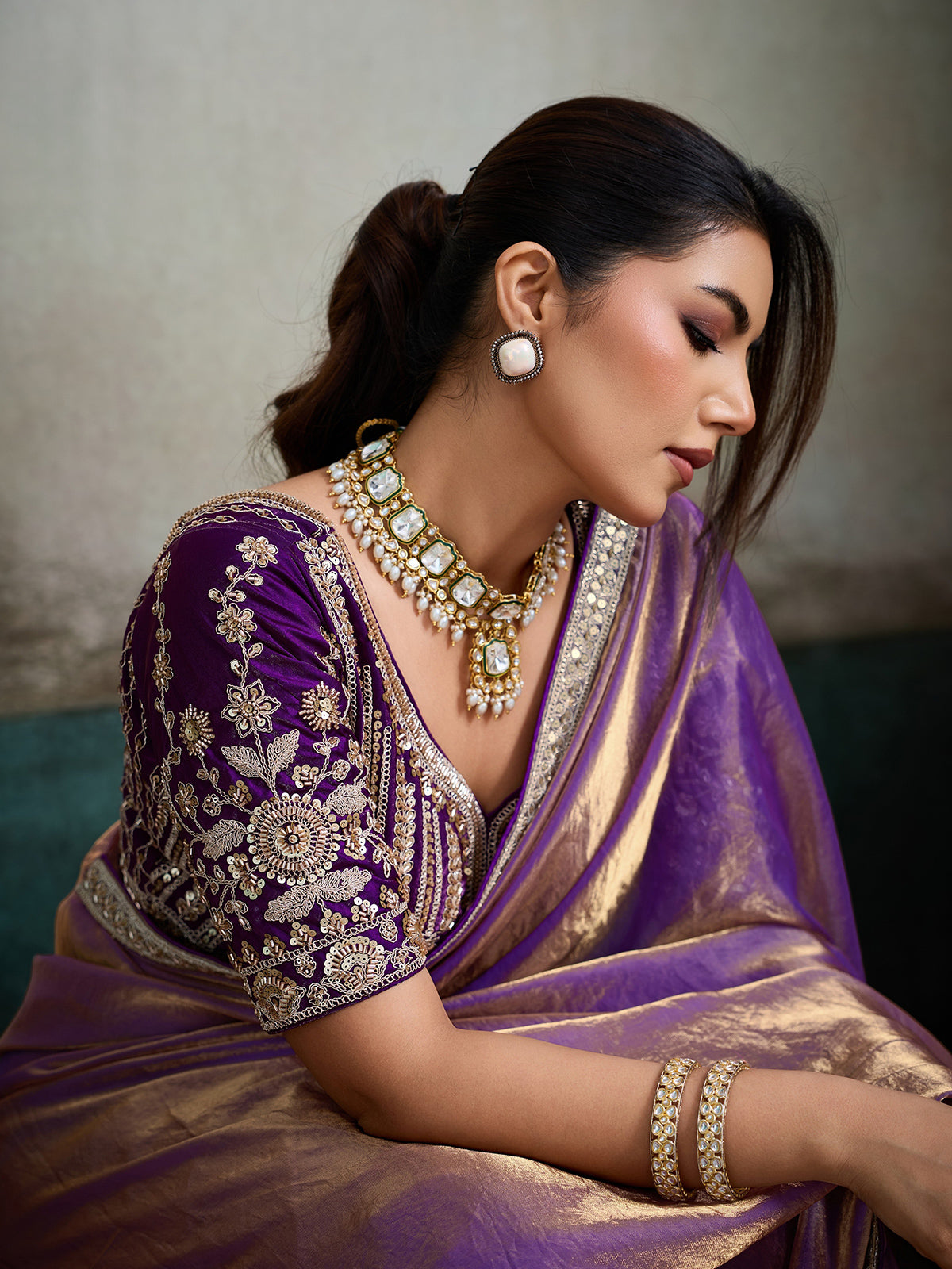 Purple dual-tone satin saree with embellished velvet blouse