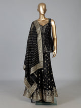 Black silk palazzo suit with elegant embellishments