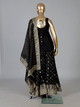 Black silk palazzo suit with elegant embellishments