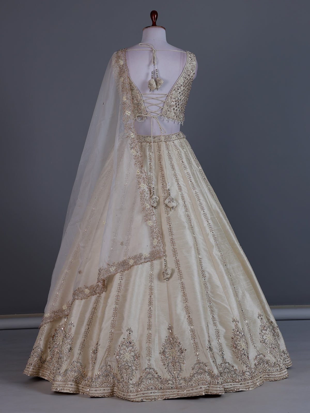 Cream raw silk designer lehenga choli with dupatta