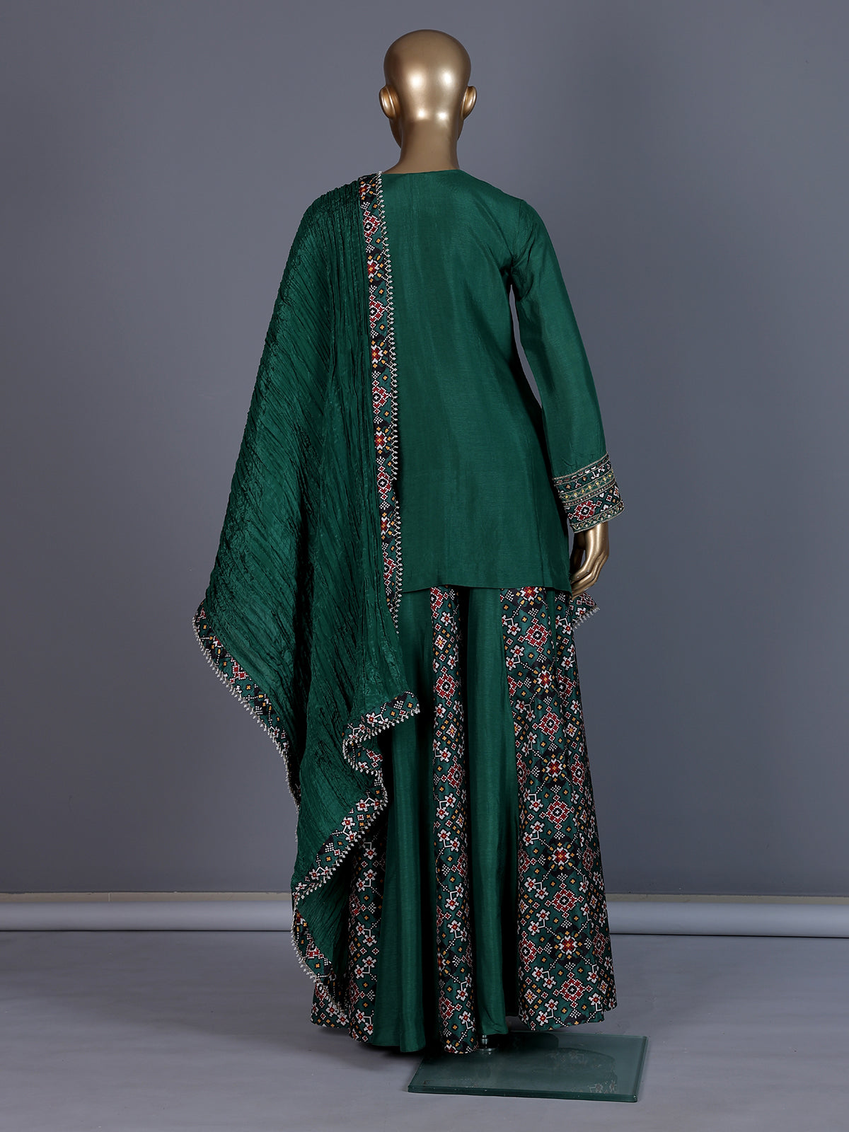Dark green embroidered silk palazzo suit with printed dupatta