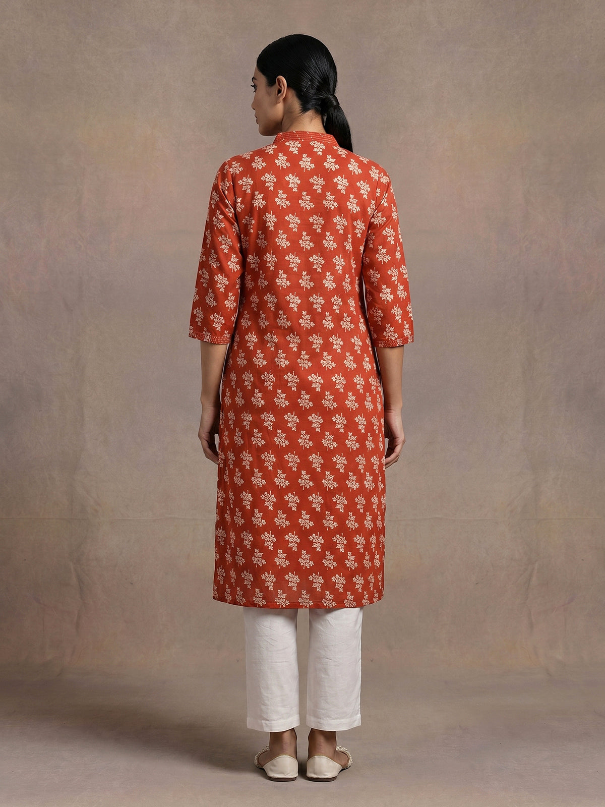 Orange floral printed cotton blend stylish casual kurti