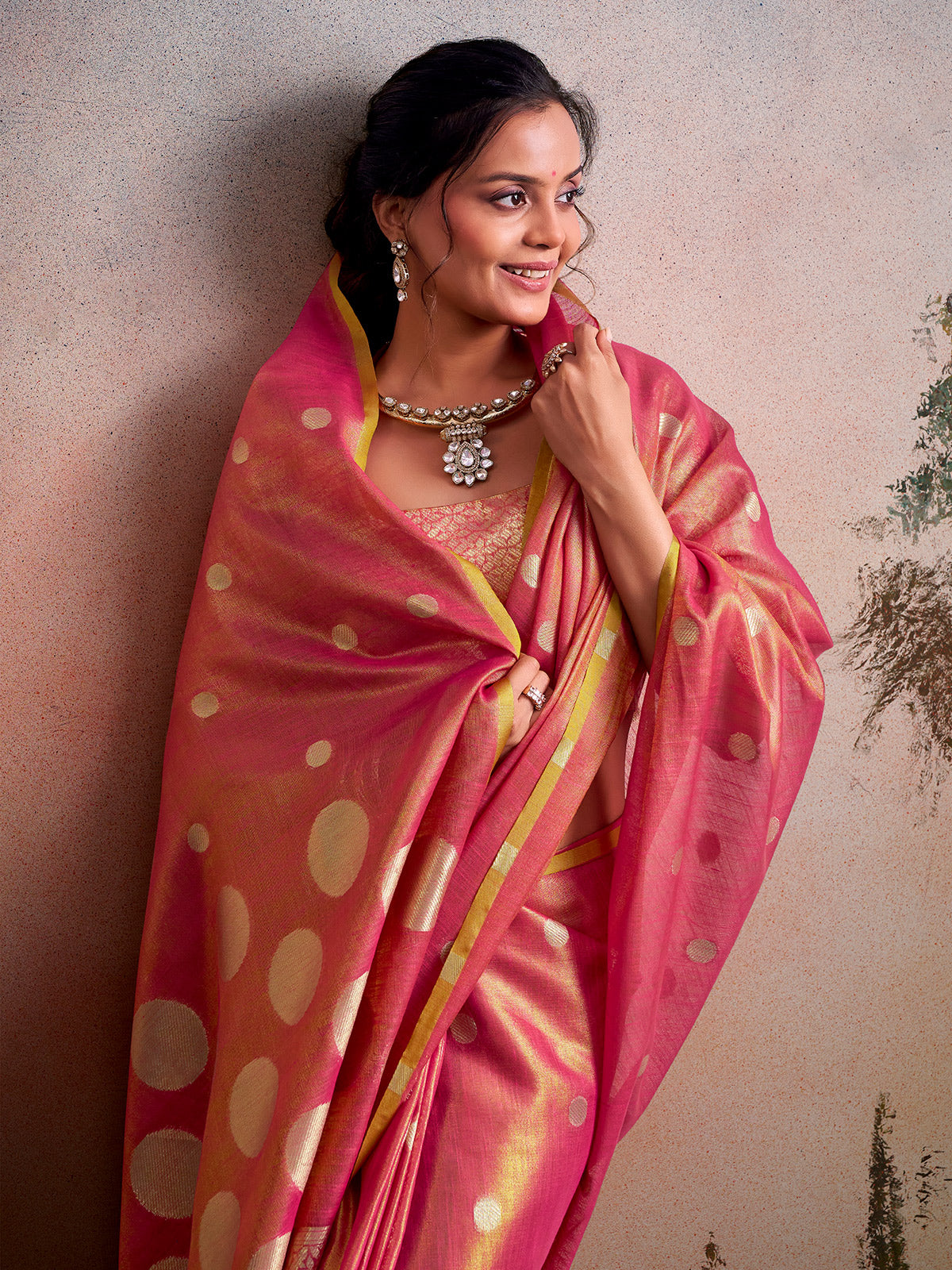 Charming pink zari woven tissue silk saree