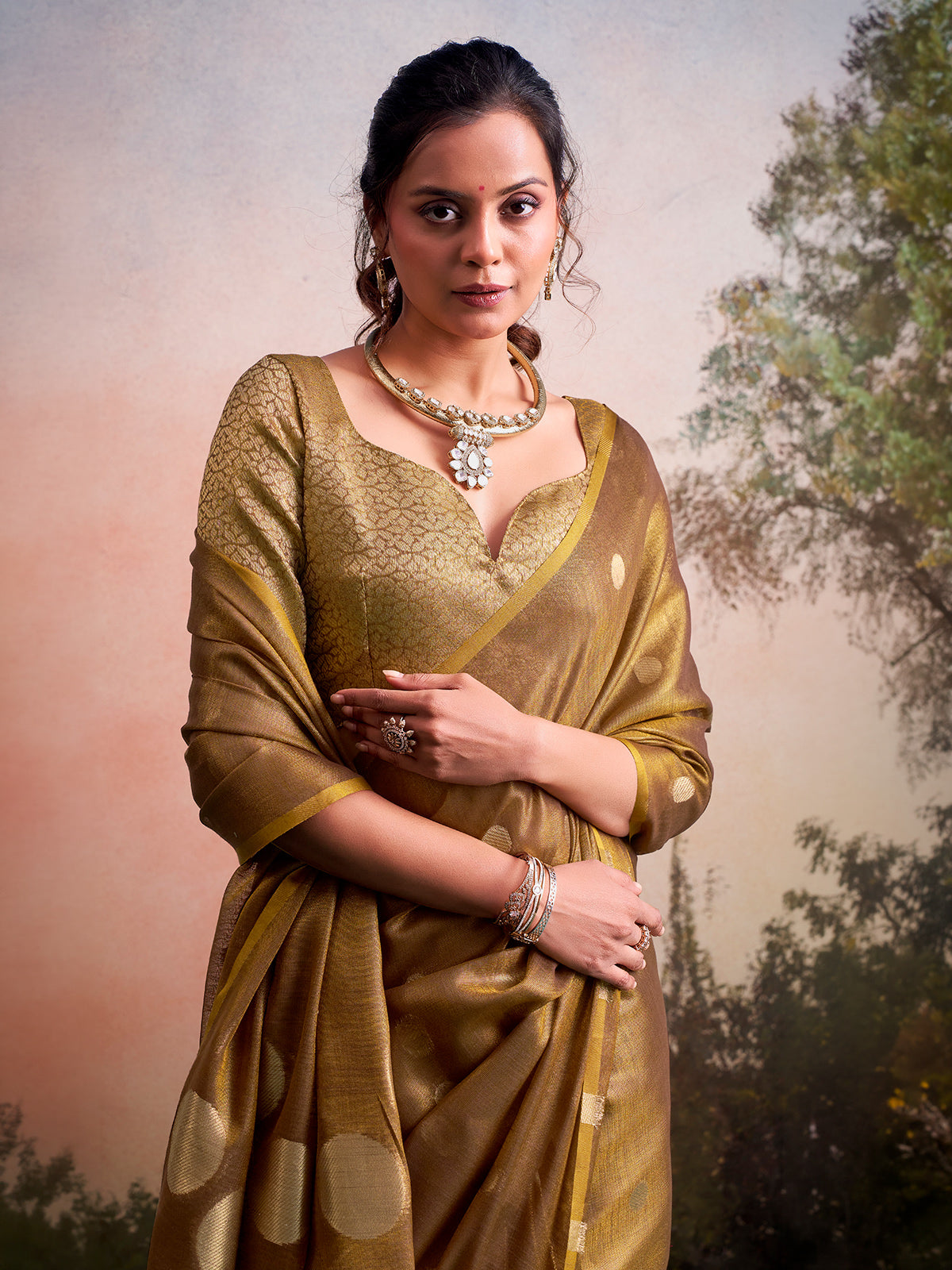Sophisticated olive zari tissue silk festive saree