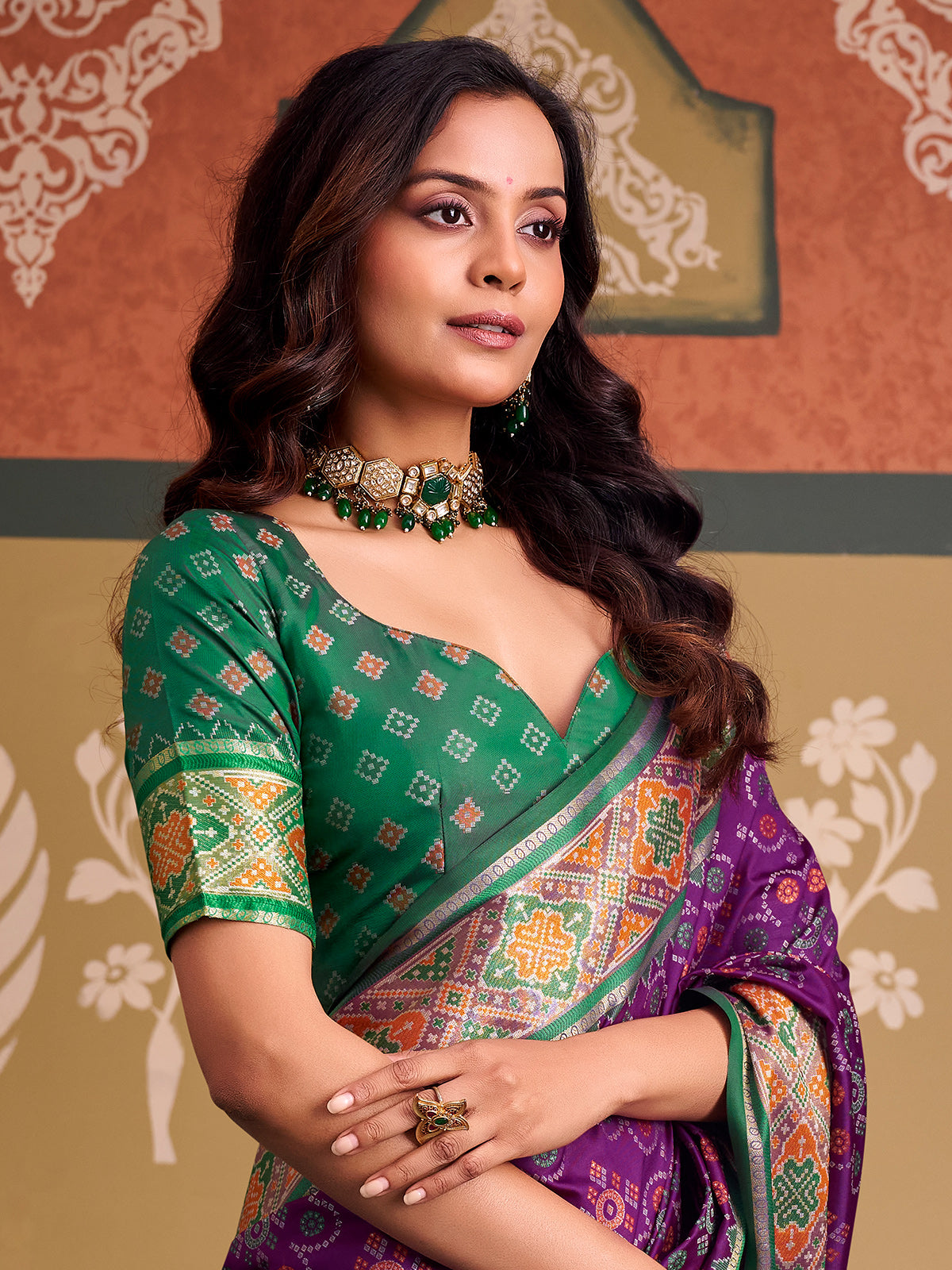 Imperial purple bandhani patola silk saree with contrast green blouse