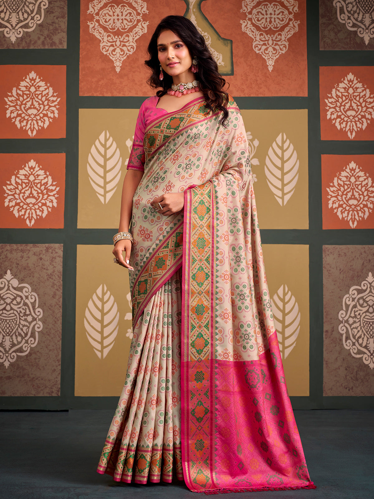 Heritage off white bandhani patola silk saree with contrast pink blouse
