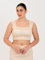 White cotton lycra curved sweetheart neck sleeveless blouse