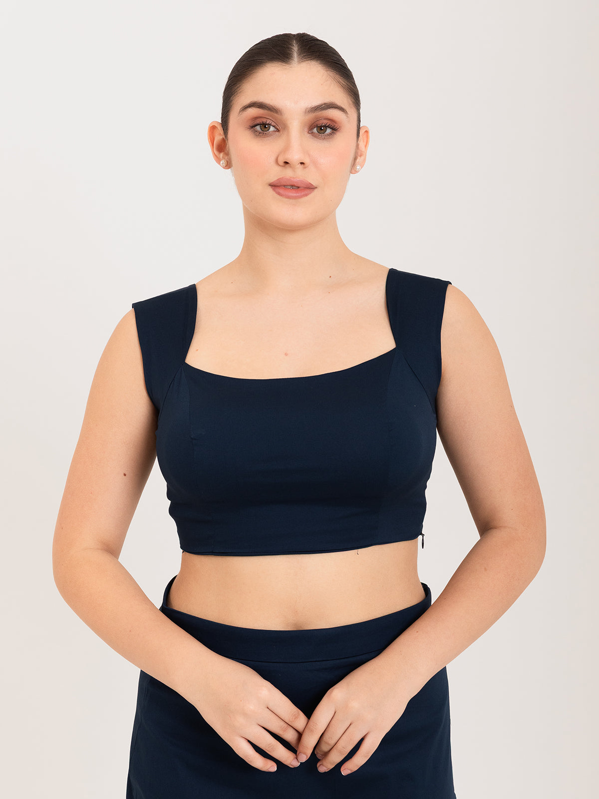 Blue cotton lycra curved sweetheart neck sleeveless blouse