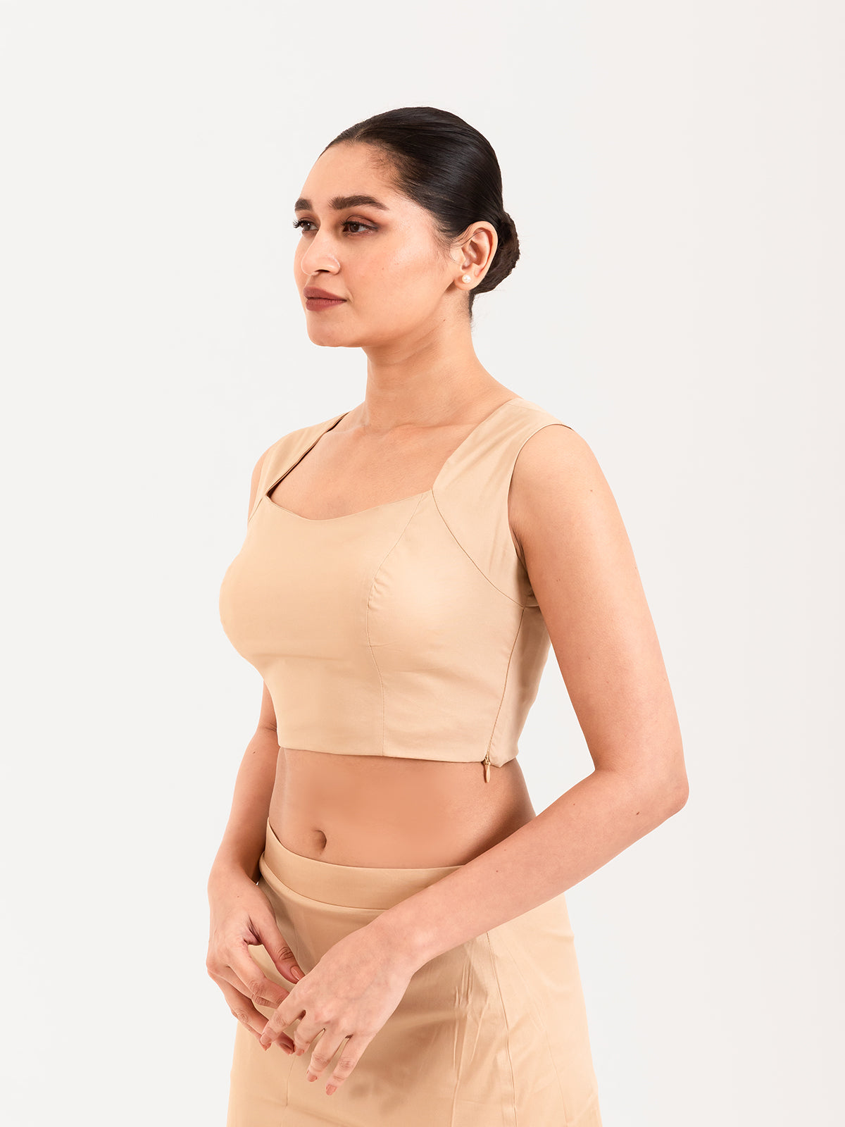 Beige cotton lycra curved sweetheart neck sleeveless blouse