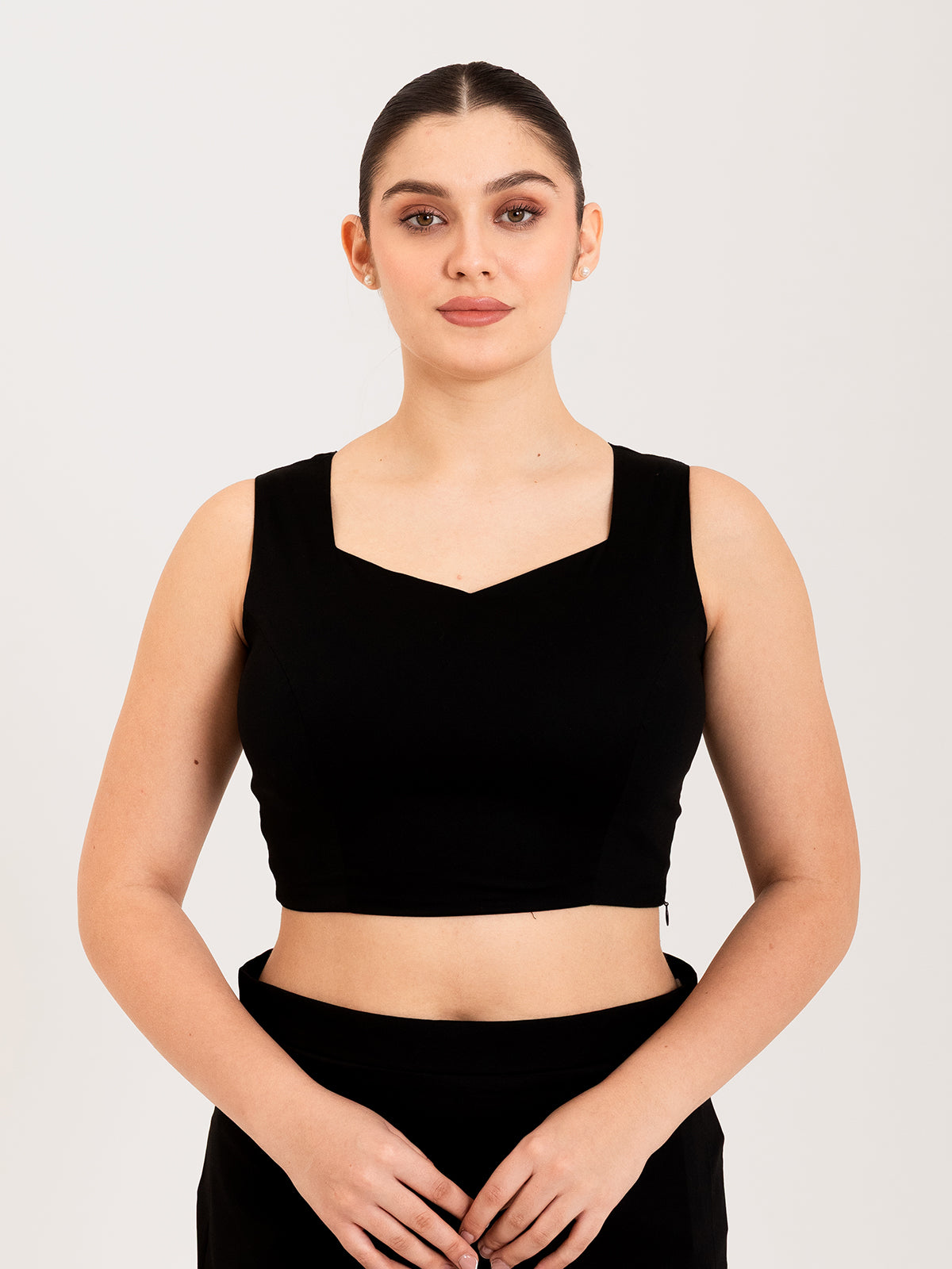 Black cotton lycra sweetheart neck sleeveless blouse