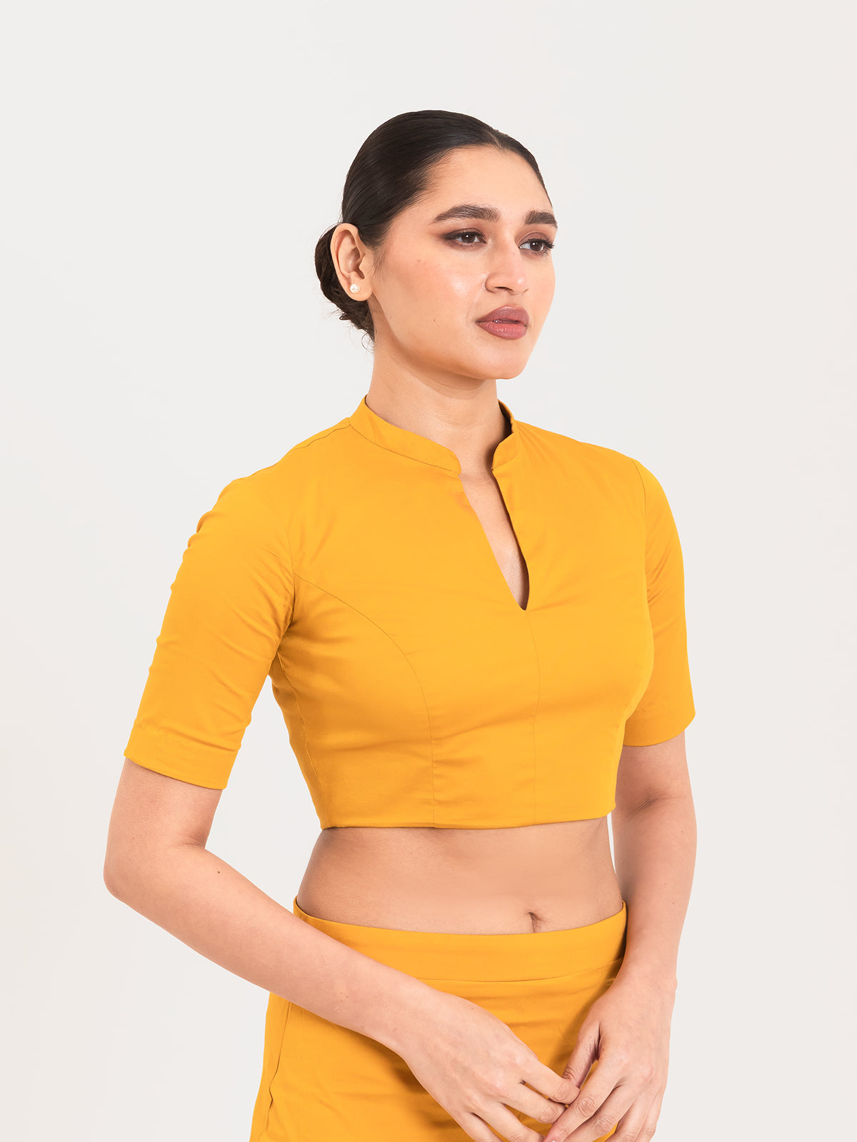 Yellow cotton lycra collar neck sleeveless blouse