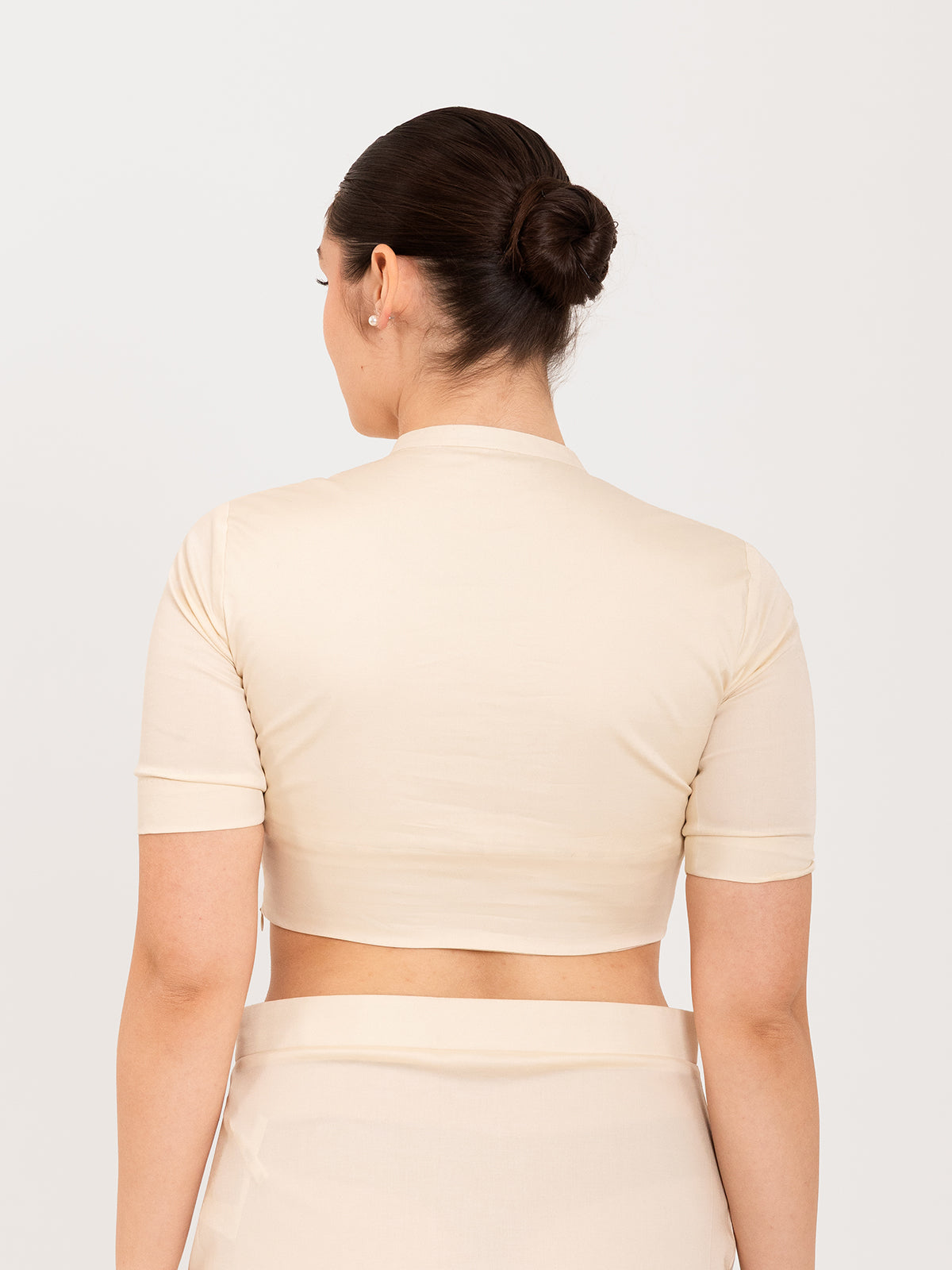 White cotton lycra collar neck sleeveless blouse