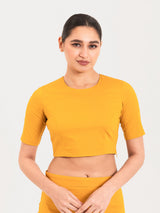 Yellow cotton lycra round neck sleeveless blouse