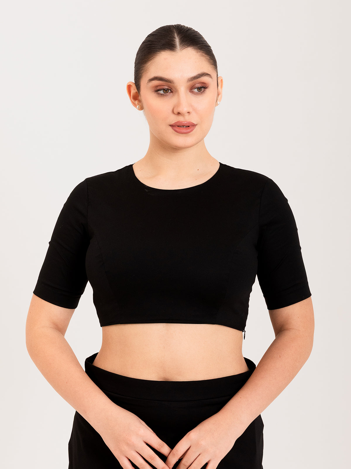 Black cotton lycra round neck sleeveless blouse