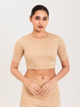 Beige cotton lycra round neck sleeveless blouse
