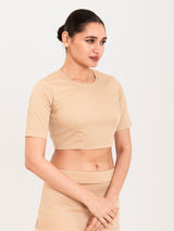 Beige cotton lycra round neck sleeveless blouse