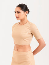 Beige cotton lycra round neck sleeveless blouse