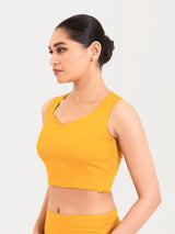 Yellow cotton lycra sweetheart neck sleeveless blouse