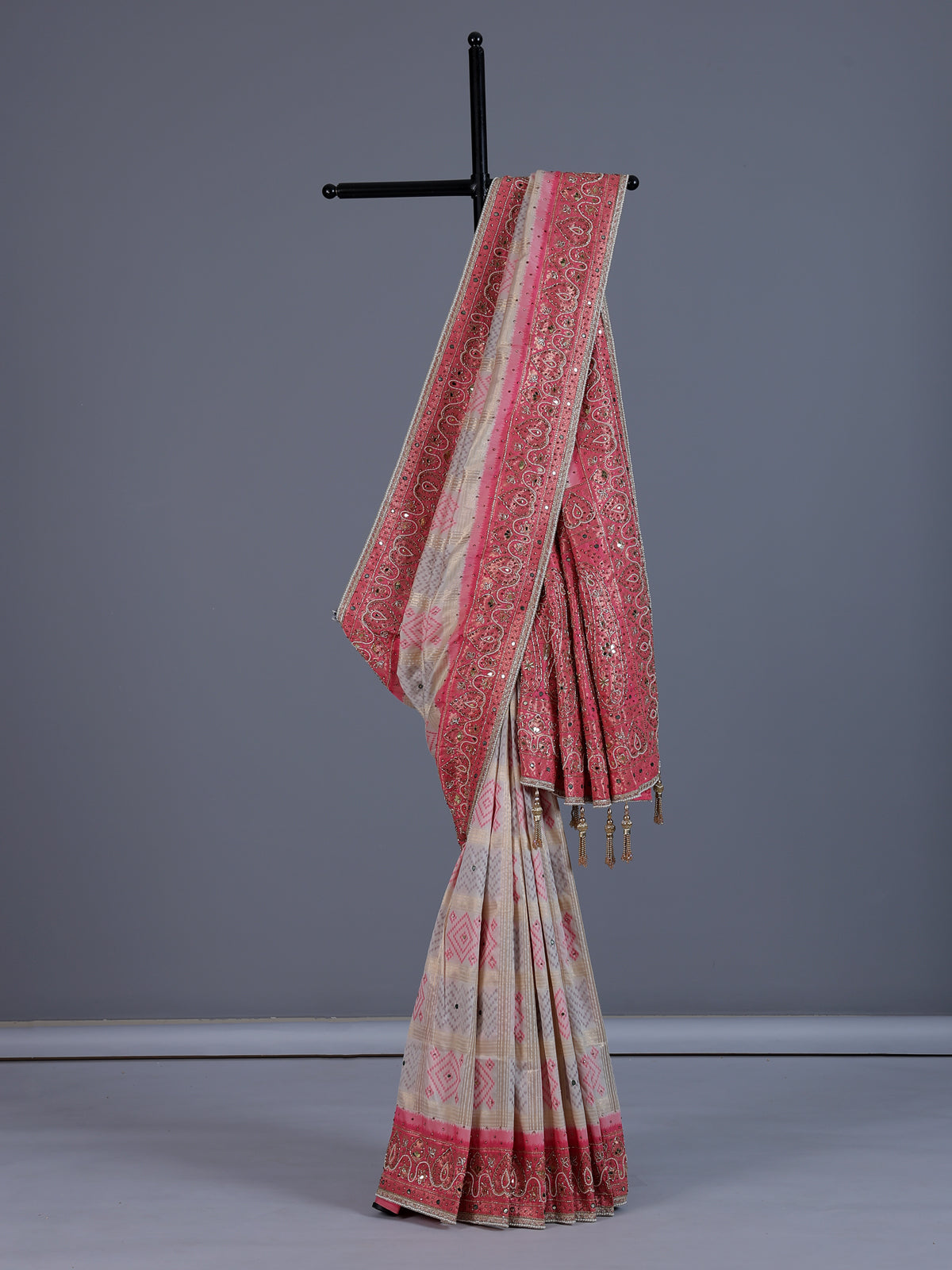 Cream art silk saree with festive printed border