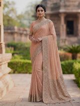 Peach dola silk saree with elegant tassel pallu