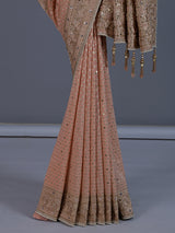 Peach dola silk saree with elegant tassel pallu