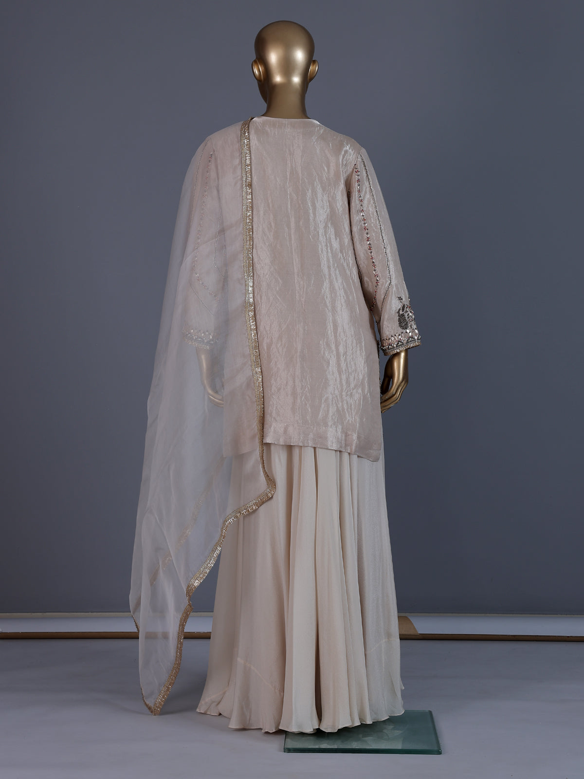 Beige designer shimmer silk sharara suit