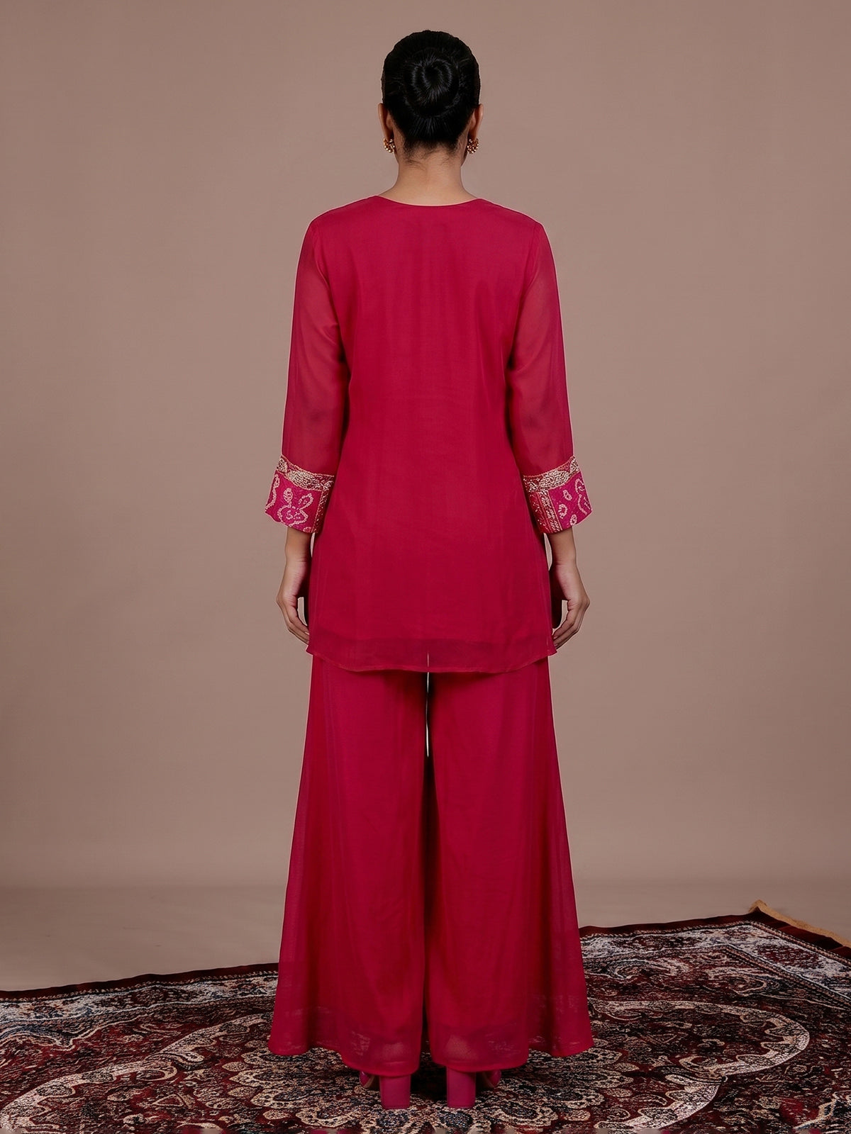 Rani pink printed georgette palazzo suit
