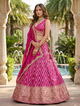 Rani pink embroidered dola silk lehenga choli with dupatta