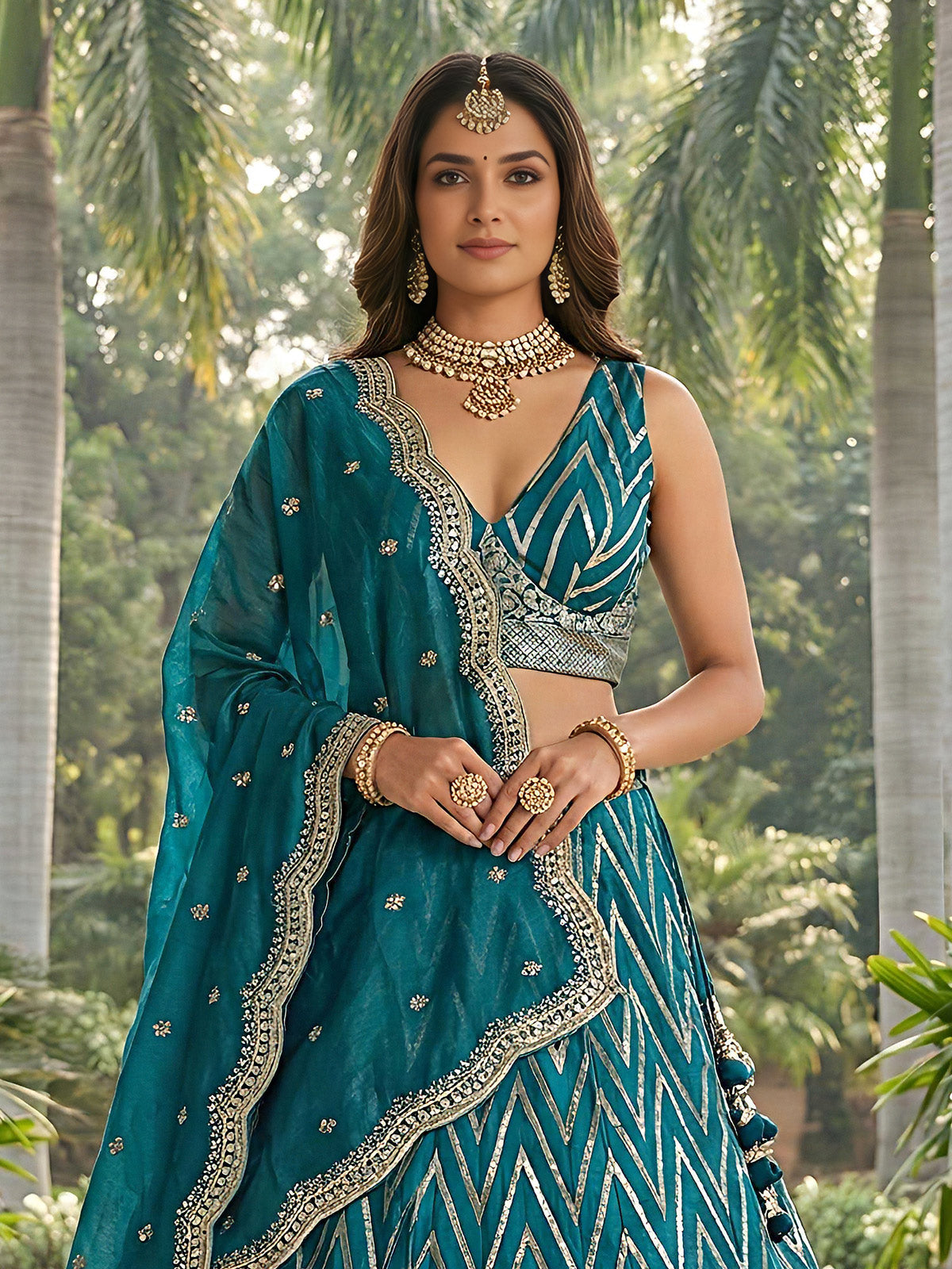 Aqua blue embroidered silk lehenga choli with dupatta
