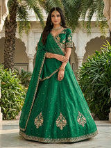 Green embroidered slub silk lehenga choli with dupatta