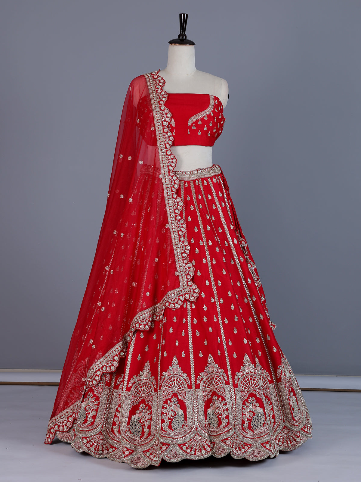 Red peacock embroidered silk lehenga choli with dupatta