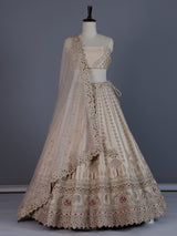 Beige designer tussar silk lehenga choli with dupatta