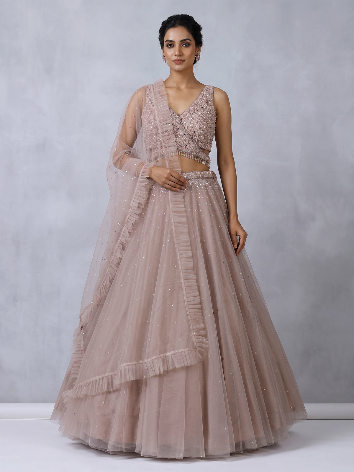 Purple designer net embellished lehenga choli