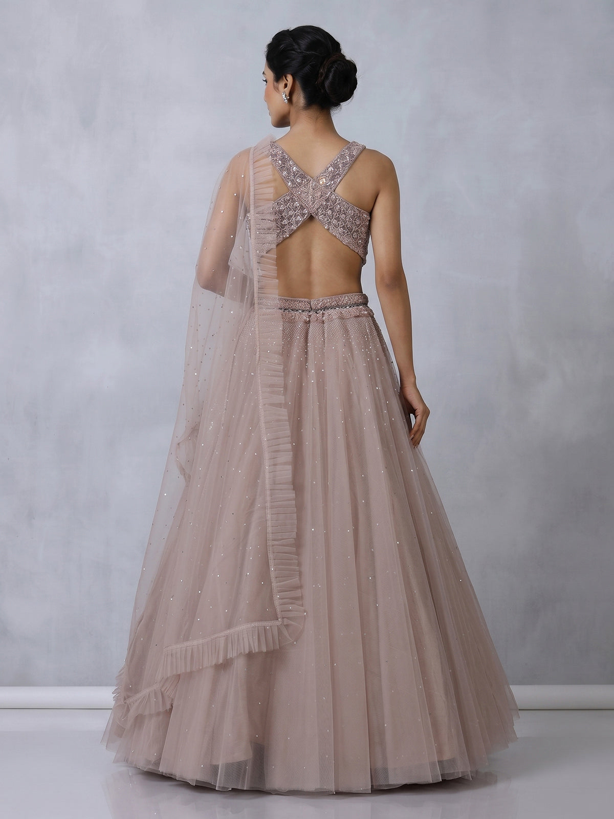 Purple designer net embellished lehenga choli