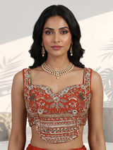 Rust orange embroidered georgette silk lehenga choli