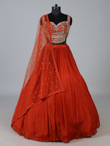 Rust orange embroidered georgette silk lehenga choli