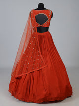 Rust orange embroidered georgette silk lehenga choli