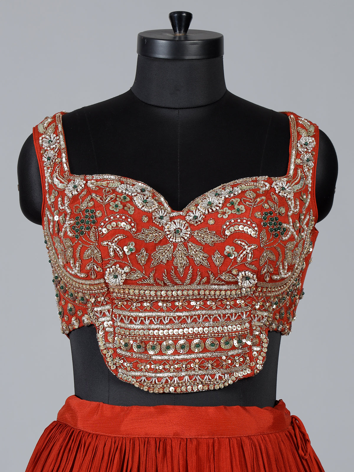 Rust orange embroidered georgette silk lehenga choli