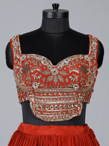 Rust orange embroidered georgette silk lehenga choli