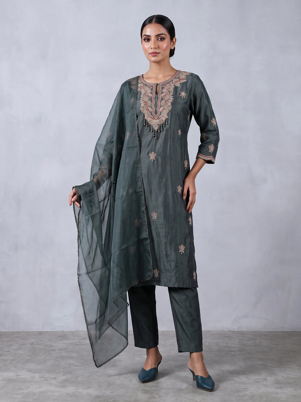 Dark green embroidered slub silk straight salwar suit
