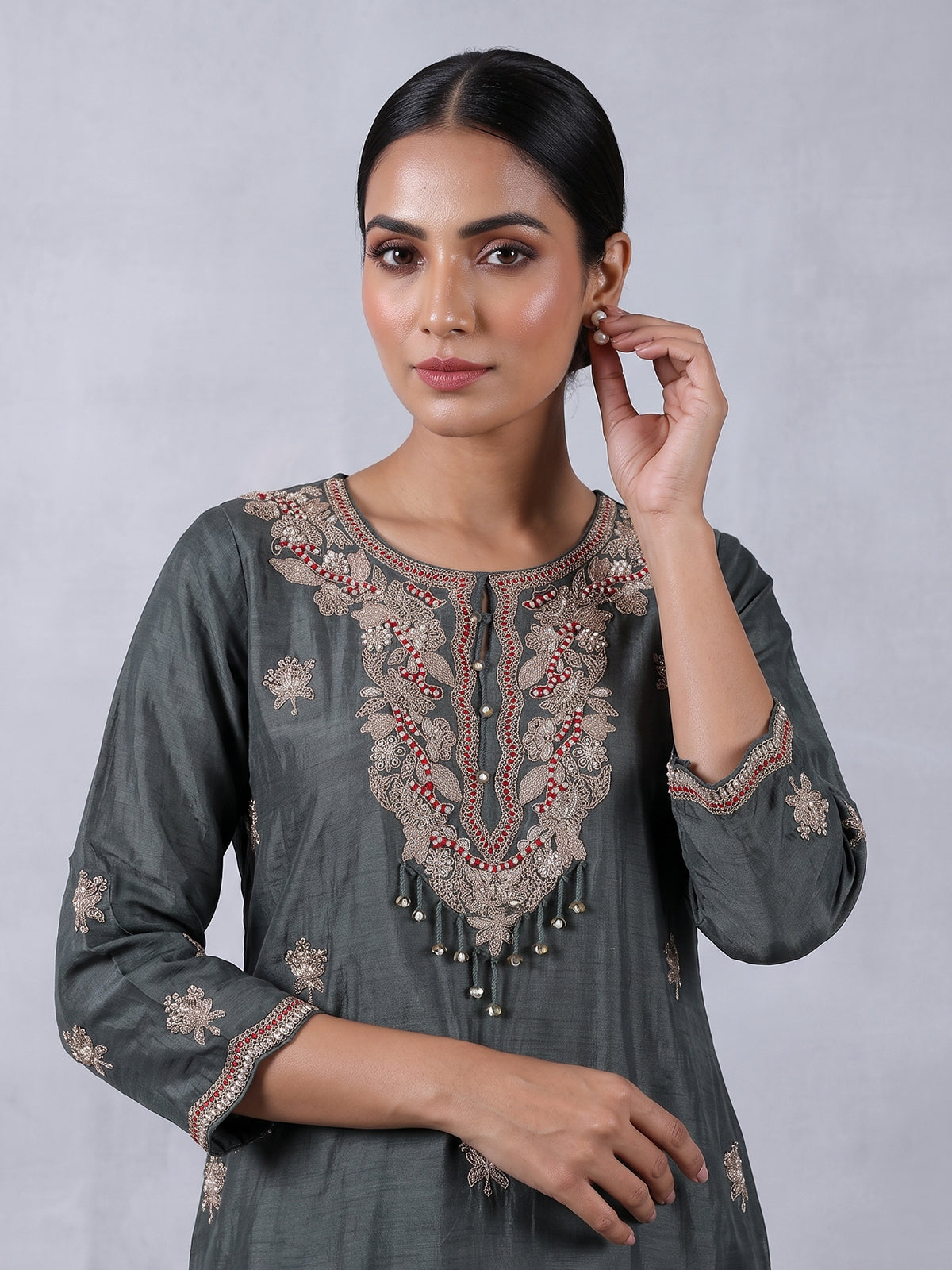 Dark green embroidered slub silk straight salwar suit